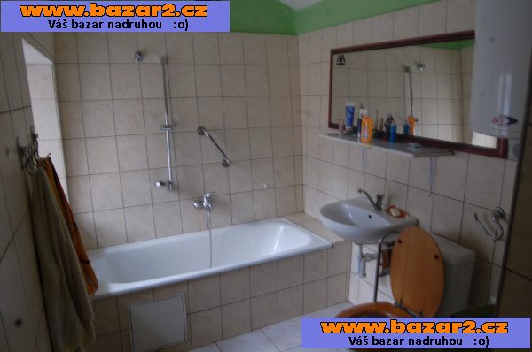 Rodinný dům s atelierem a zahradou,dvorkem 4+1 po částečné  rekonstrukci