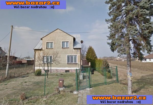 Dům se dvěma garážema