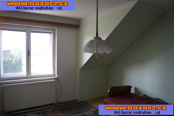 Dům se dvěma garážema
