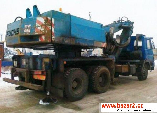 Fuchs 713 překládací bagr T815  , r.v. 2002, barva