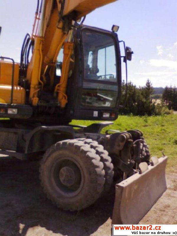 Hyundai 170W kol. rypadlo 18t  87kW, r.v. 2008,