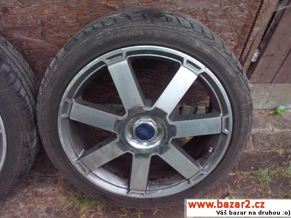 Orig. alu kola Ford 18 + skoro nové