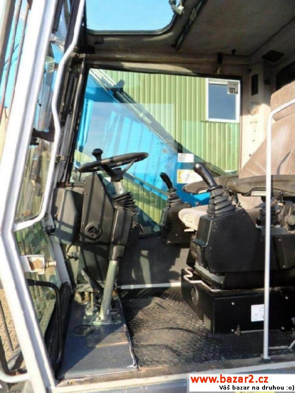 Fuchs 320 prekladaci 20t  83kW, r.v. 2007, barva